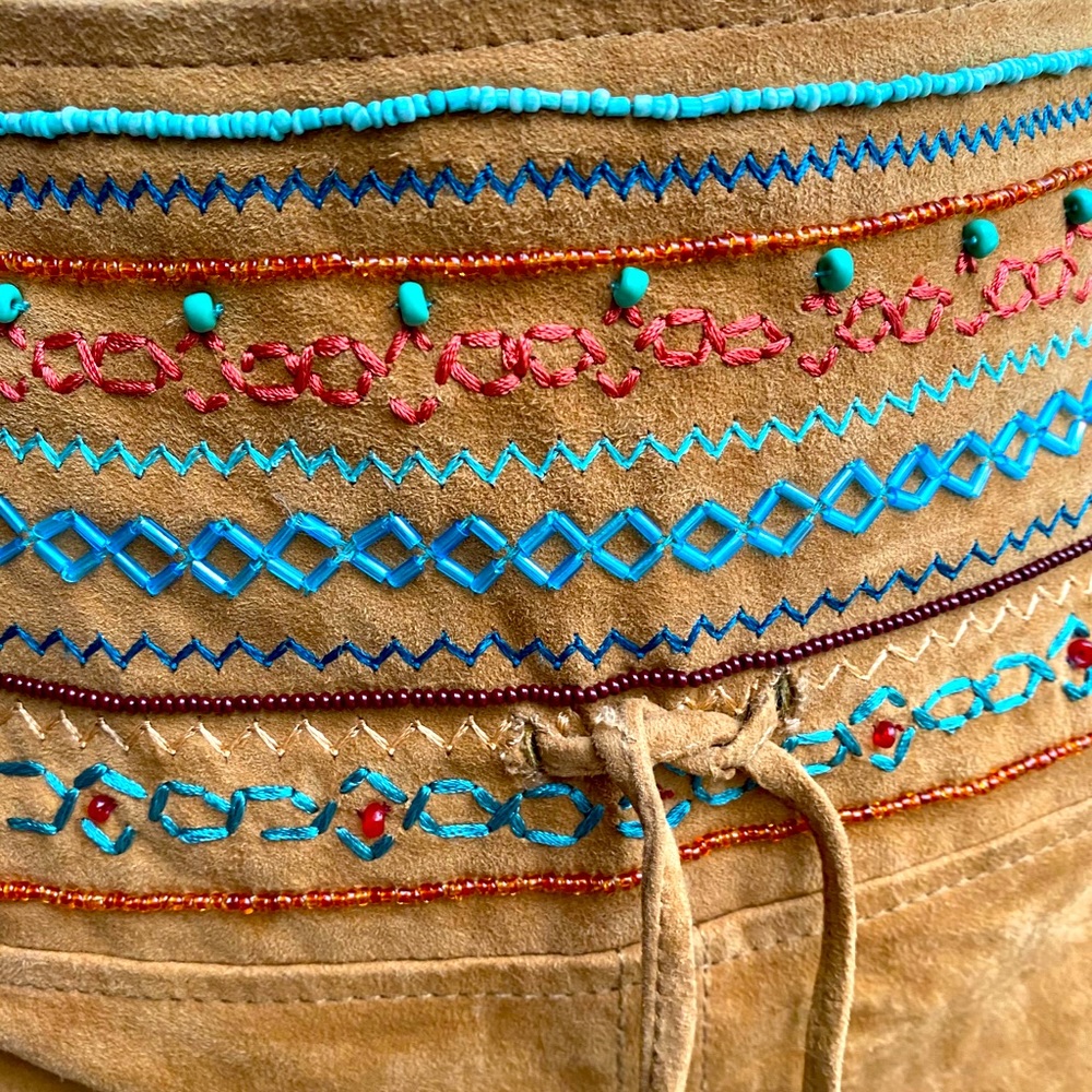 Goat suede skirt designer